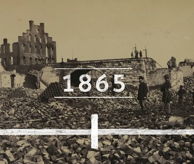“1865” set over a photograph of a ruined city